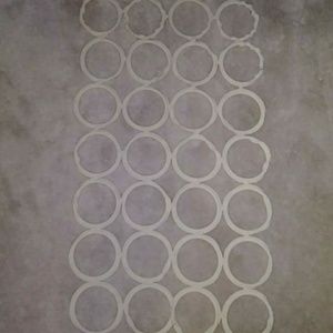 Tons of scarves and scarf holder